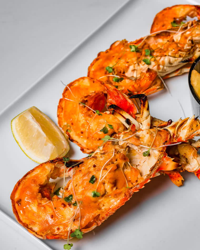 Grilled lobster with lemon and micro herbs